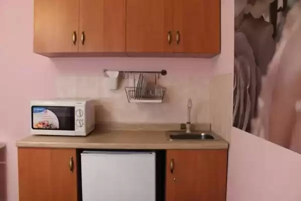 Частный сектор «Дом Персона с кухней в номерах»