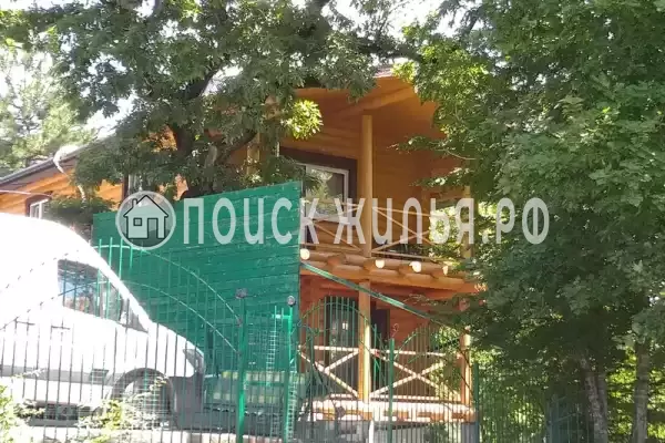 Частный сектор «Бревенчатый дом в лесу у моря»