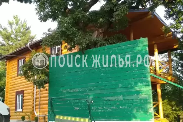 Частный сектор «Бревенчатый дом в лесу у моря»