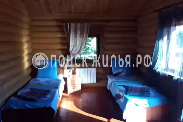 Частный сектор «Бревенчатый дом в лесу у моря»